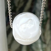 abstract white cremation bead